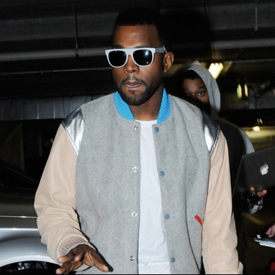 Kanye West shown wearing sunglasses at night so he can keep track of the visions in his eyes.